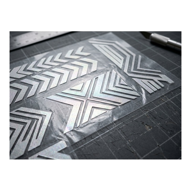 Molded TPU footwear branding badges
